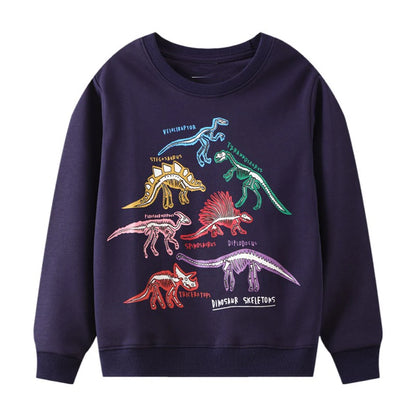 Go Glow dinosaur sweater featuring glowing dinosaur skeleton illustrations in various colors on a dark background.