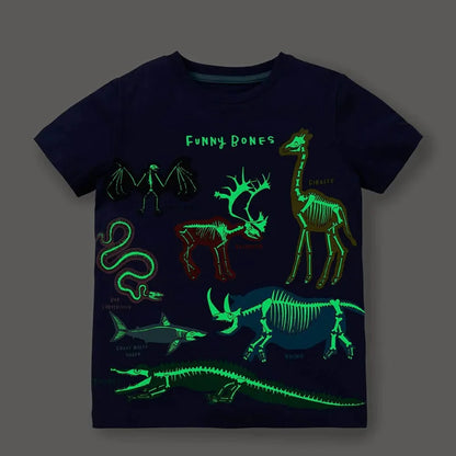 Go Glow dinosaur t-shirt featuring glowing dinosaur skeleton illustrations on a dark background.